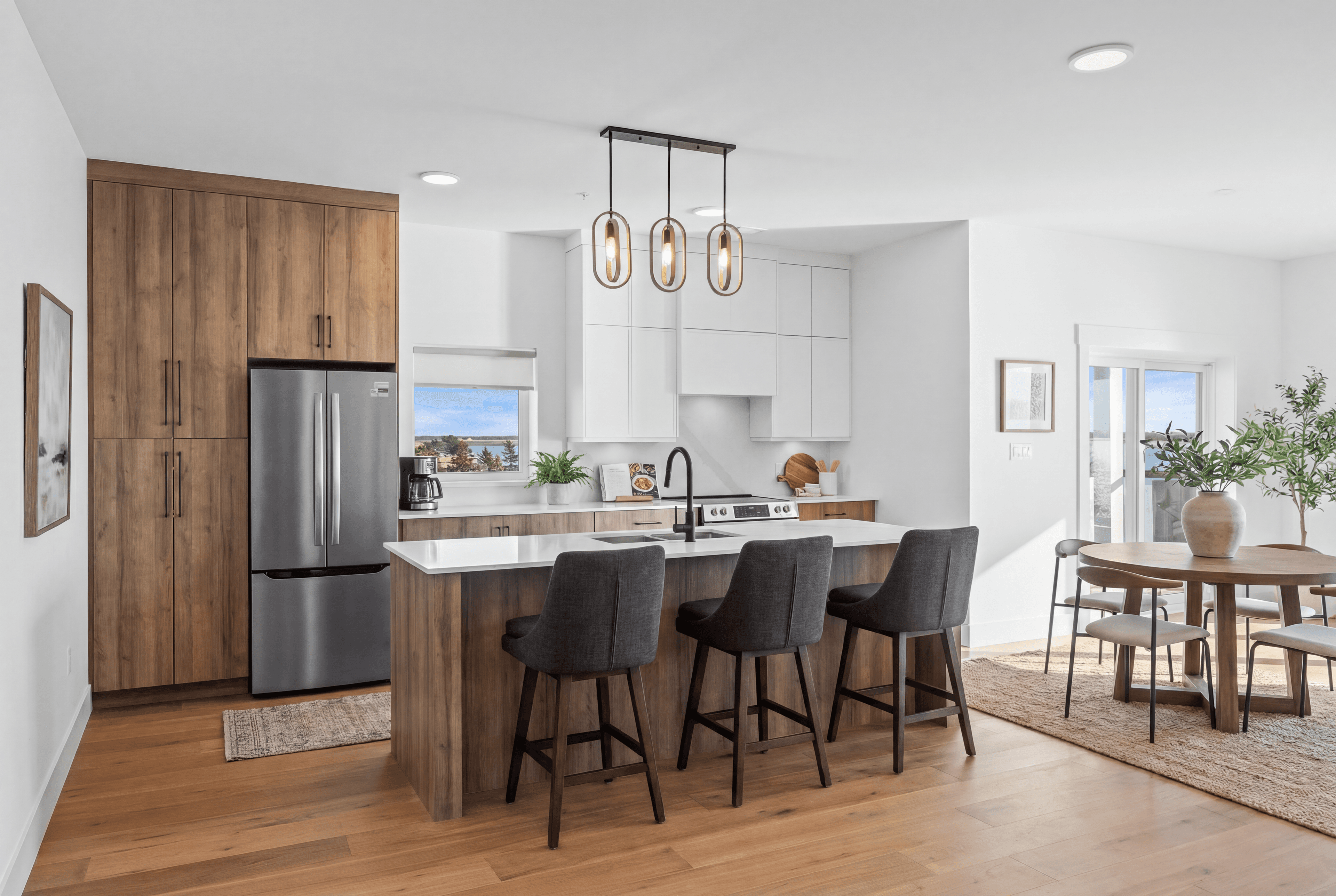 Designer kitchen with custom cabinetry and quartz countertops